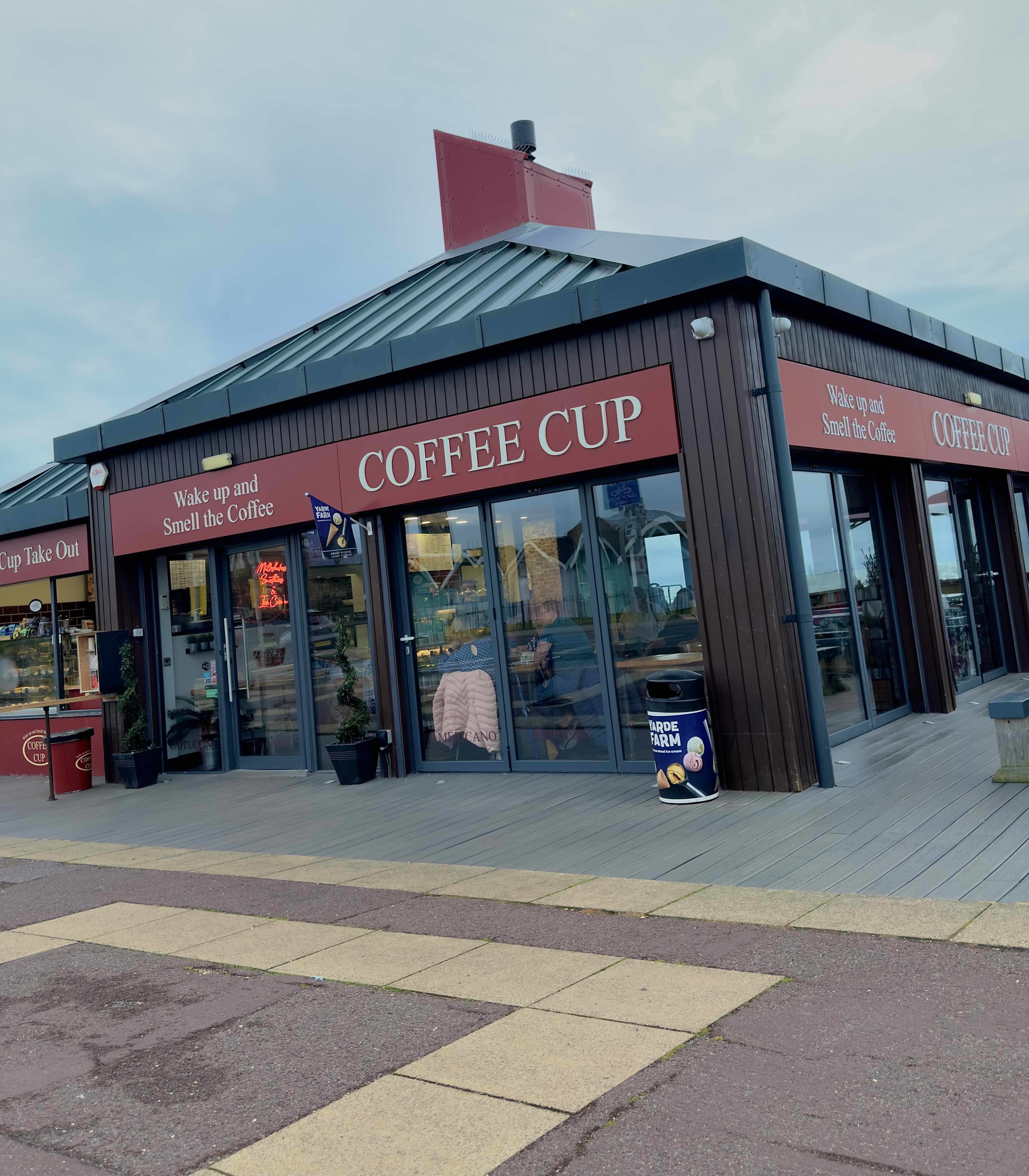 Catching up for a Coffee in, Coffee Cup on the Beach with a friend, October 2023